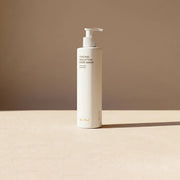 Tricho Solution Hair Mask bottle on a beige surface, promoting hair growth mask benefits.
